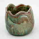 pinch pot with design at rim, 4" high, 